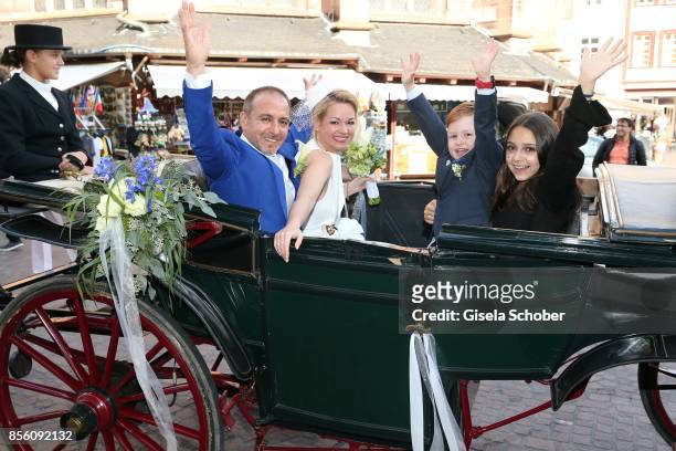 Bridegroom Erdogan Atalay and his bride Katja Ohneck with Amira "Pauletta" Pollmann, daughter of Erdogan Atalay and Maris Atalay, son of Erdogan and...