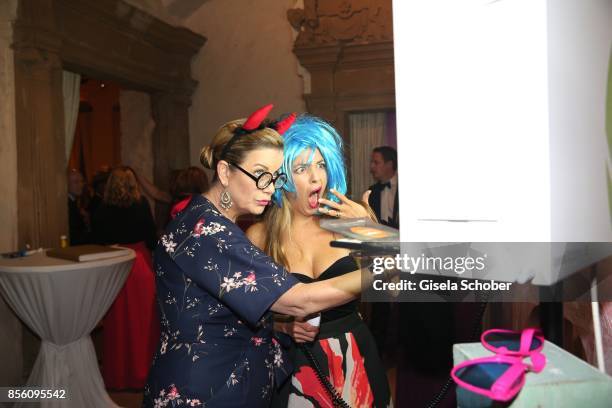 Alexa Maria Surholt and Arzu Bazman during the church wedding of Erdogan Atalay and Katja Ohneck at Heidelberg Castle on September 30, 2017 in...