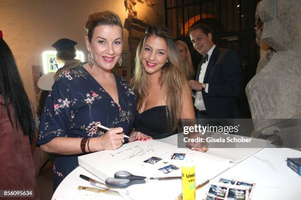 Alexa Maria Surholt and Arzu Bazman during the church wedding of Erdogan Atalay and Katja Ohneck at Heidelberg Castle on September 30, 2017 in...