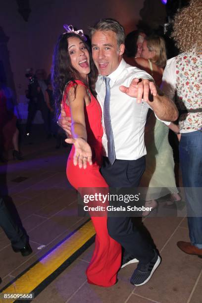 Marco Girnth and his wife Katja Woywood during the church wedding of Erdogan Atalay and Katja Ohneck at Heidelberg Castle on September 30, 2017 in...