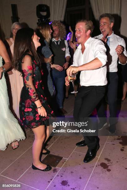 Daniel Roesner and his girlfriend Cara Stalder during the church wedding of Erdogan Atalay and Katja Ohneck at Heidelberg Castle on September 30,...