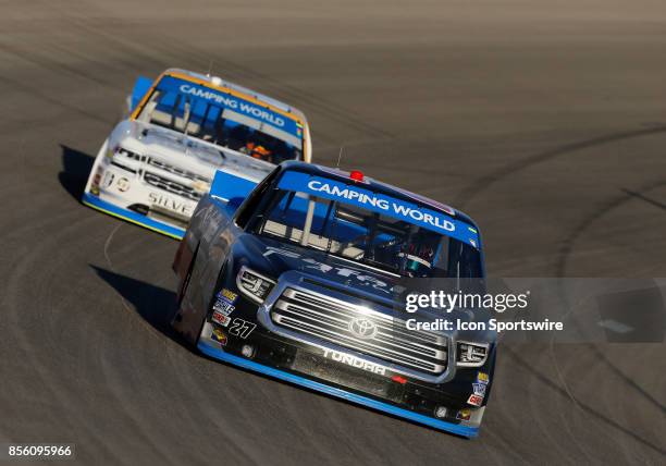 Ben Rhodes ThorSport Toyota Tundra races ahead of Kaz Grala GMS Racing Chevrolet Silverado on September 30, 2017 at the NASCAR Playoff Las Vegas 350...