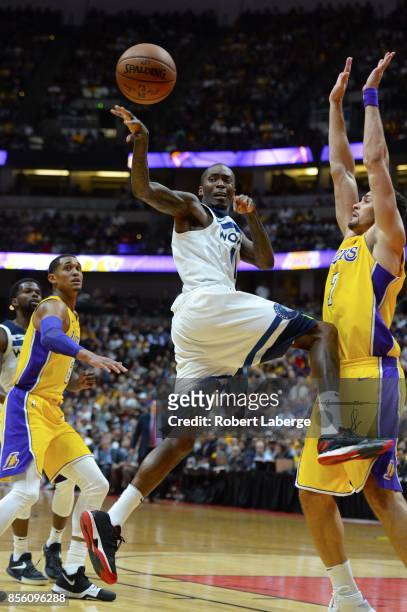 Jamal Crawford of the Minnesota Timberwolves makes a pass as Larry Nance Jr. #7 of the Los Angeles Lakers tries to block him on September 30, 2017 at...