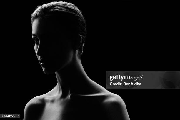 moody portrait of a girl - skin care black and white portrait stock pictures, royalty-free photos & images