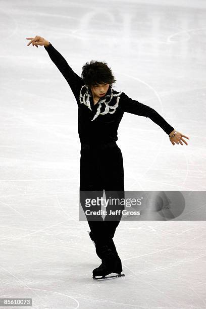 Takahito Mura of Japan competes in the Men's Short Program during the 2009 ISU World Figure Skating Championships at Staples Center March 25, 2009 in...