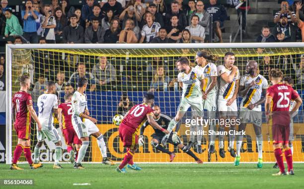Joao Plata of Real Salt Lake takes a fee kick saved by Clement Diop of Los Angeles Galaxy during the Los Angeles Galaxy's MLS match against Real Salt...