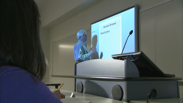 Video Professor 40 Professor Teaching From Podium Stock Videos, Footage, & 4K Video ...