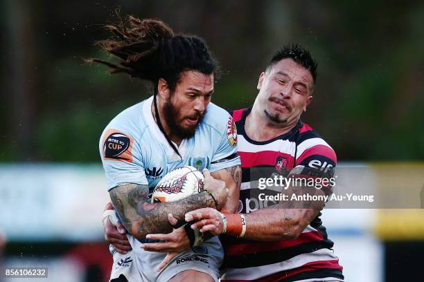 Rene Ranger of Northland is tackled by Joe Royal of Counties Manukau during the round seven Mitre 10 Cup match between Counties Manukau and Northland...