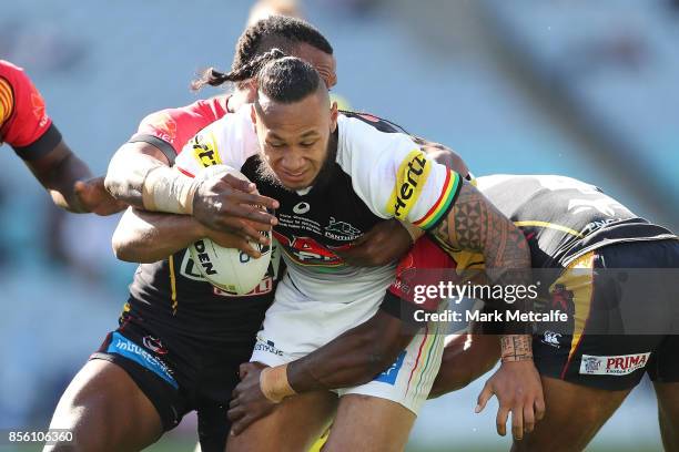 Tony Satini of the Panthers is tackled during the 2017 State Championship Final between the Penrith Panthers and Papua New Guinea Hunters at ANZ...