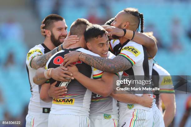 Darren Nicholls of the Panthers is congratulated by team mates after scoring a try during the 2017 State Championship Final between the Penrith...