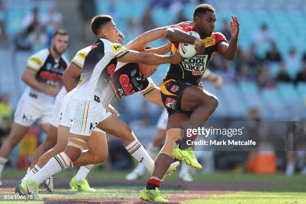 Moses Meninga of the Hunters is tackled during the 2017 State Championship Final between the Penrith Panthers and Papua New Guinea Hunters at ANZ...