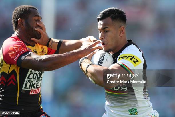 Christian Crichton of the Panthers is tackled during the 2017 State Championship Final between the Penrith Panthers and Papua New Guinea Hunters at...