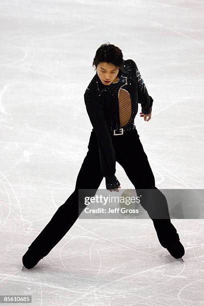 Jianliang Wu of China competes in the Men's Short Program during the 2009 ISU World Figure Skating Championships at Staples Center March 25, 2009 in...