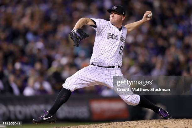 Picther Jake McGee of the Colorado Rockies throws in the seventh inning against the Los Angeles Dodgers at Coors Field on September 30, 2017 in...