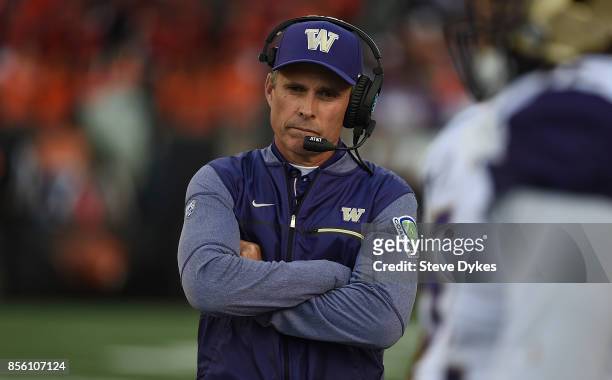 Head coach Chris Petersen # of the Washington Huskies looks on from the sidelines during the third quarter of the game against the Oregon State...