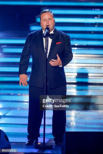 British opera singer Paul Potts performs during the tv show 'Willkommen bei Carmen Nebel' at TUI Arena on September 30, 2017 in Hanover, Germany.
