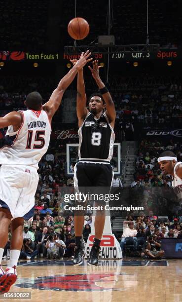 Roger Mason of the San Antonio Spurs puts up a shot against the Atlanta Hawks at Philips Arena on March 25, 2009 in Atlanta, Georgia. NOTE TO USER:...