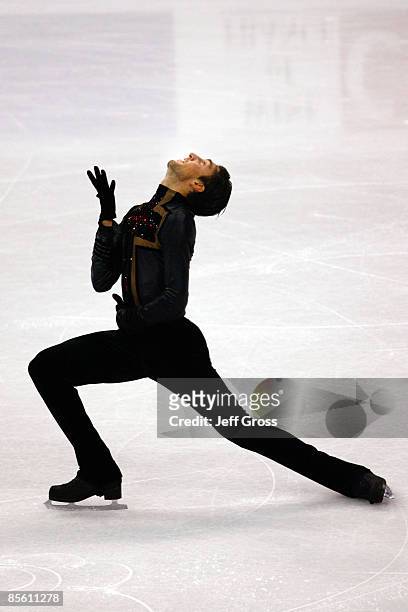 Evan Lysacek of the United States competes in the Men's Short Program during the 2009 ISU World Figure Skating Championships at Staples Center March...