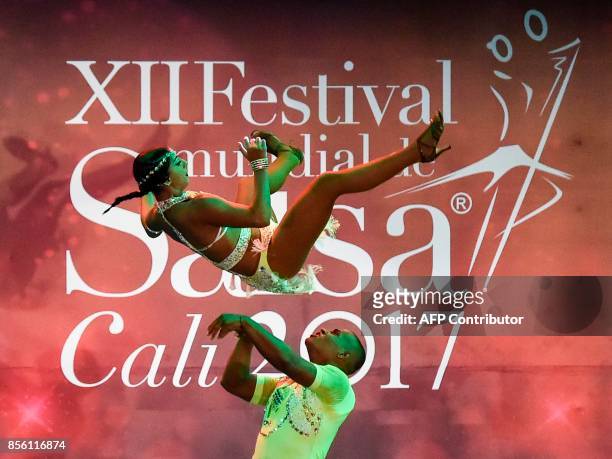 Colombian salsa dancers Karen Delgado and Miguel Fajardo of "Constelacion Latina" dance group, participate in the Cabaret Couples category during the...