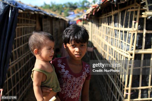 Coxs Bazar, Bangladesh. September 24, 2017. Rohingya refugee children seen at a refugee camp in Coxs Bazar, Bangladesh on September 24, 2017. Over...