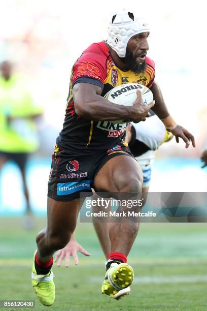 Adex Wera of the Hunters is tackled during the 2017 State Championship Final between the Penrith Panthers and Papua New Guinea Hunters at ANZ Stadium...