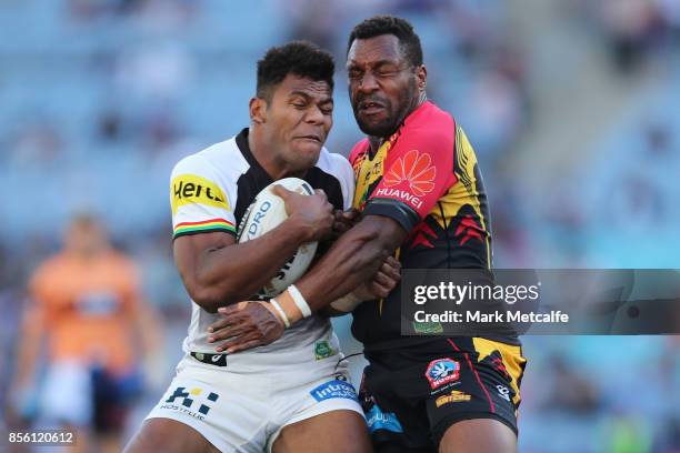 Maika Sivo of the Panthers is tackled during the 2017 State Championship Final between the Penrith Panthers and Papua New Guinea Hunters at ANZ...