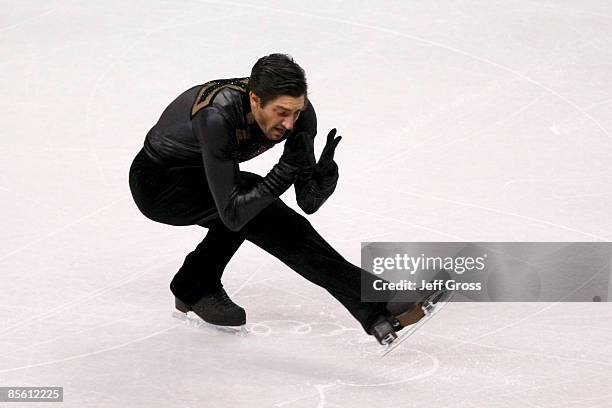 Evan Lysacek of the United States competes in the Men's Short Program during the 2009 ISU World Figure Skating Championships at Staples Center March...