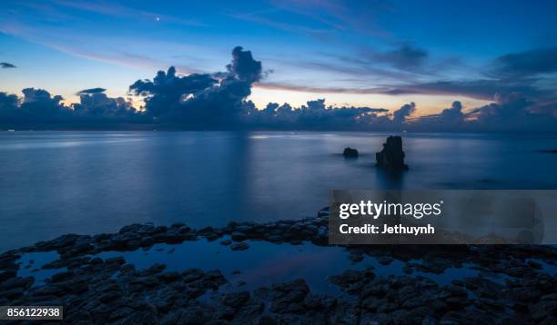 seascape in vietnam - sunrise over thach ky dieu tau, a wonder of quang ngai - quảng ngãi stock pictures, royalty-free photos & images