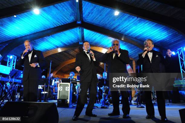 Jimmy Spinelli, Tommy Petillo, Tony Testa and Phil Granito of The Duprees perform at Town Hall Park on September 30, 2017 in Lyndhurst, New Jersey.