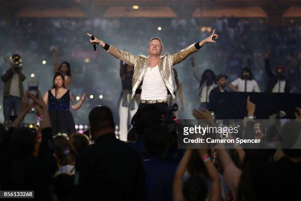 Macklemore performs before the 2017 NRL Grand Final match between the Melbourne Storm and the North Queensland Cowboys at ANZ Stadium on October 1,...