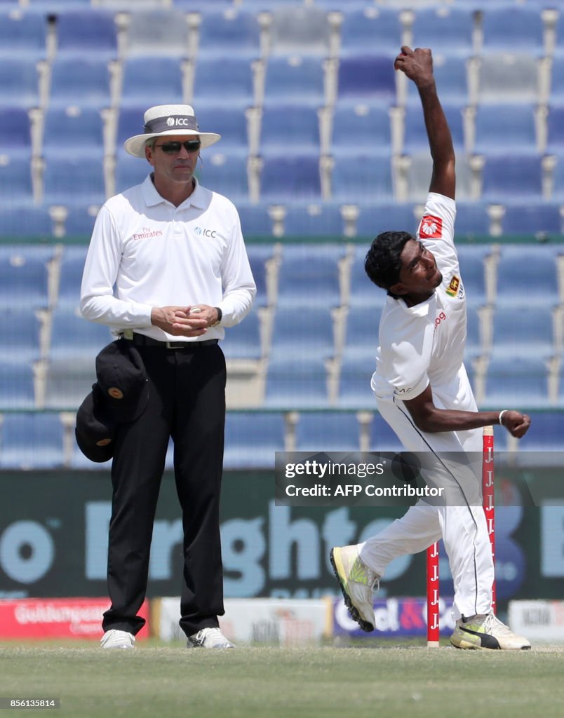 Lakshan Sandakan of Sri Lanka bowls during the fourth day of the