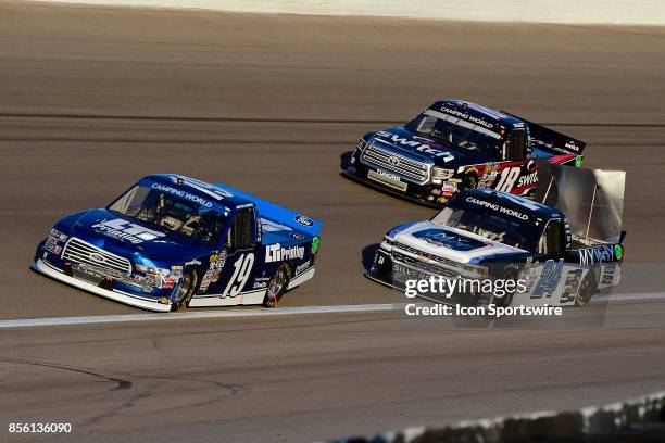 Austin Cindric Brad Keselowski Racing Ford F-Series leads Justin Haley GMS Racing Chevrolet Silverado and Noah Gragson Kyle Busch Motorsports Toyota...