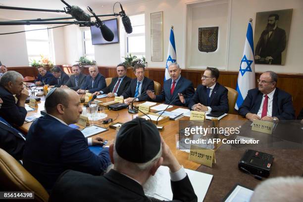 Israeli Prime Minister Benjamin Netanyahu attends the weekly cabinet meeting at his office in Jerusalem on October 1, 2017. / AFP PHOTO / POOL /...