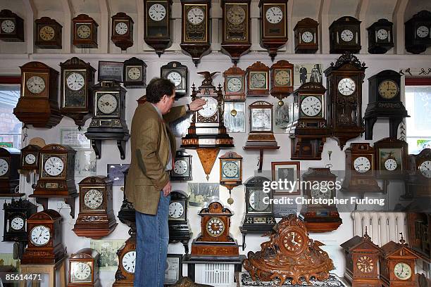 Horologist Roman Piekarski starts the time consuming task of adjusting the 600 antique clocks at Cuckooland Museum in readiness for this weekends...