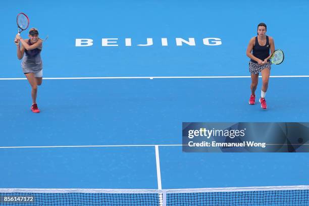 Anastasija Sevastova of Latvia and Donna Vekic of Croatia return a shot against Sloane Stephens of USA and Heather Watson of Great Britain on day two...