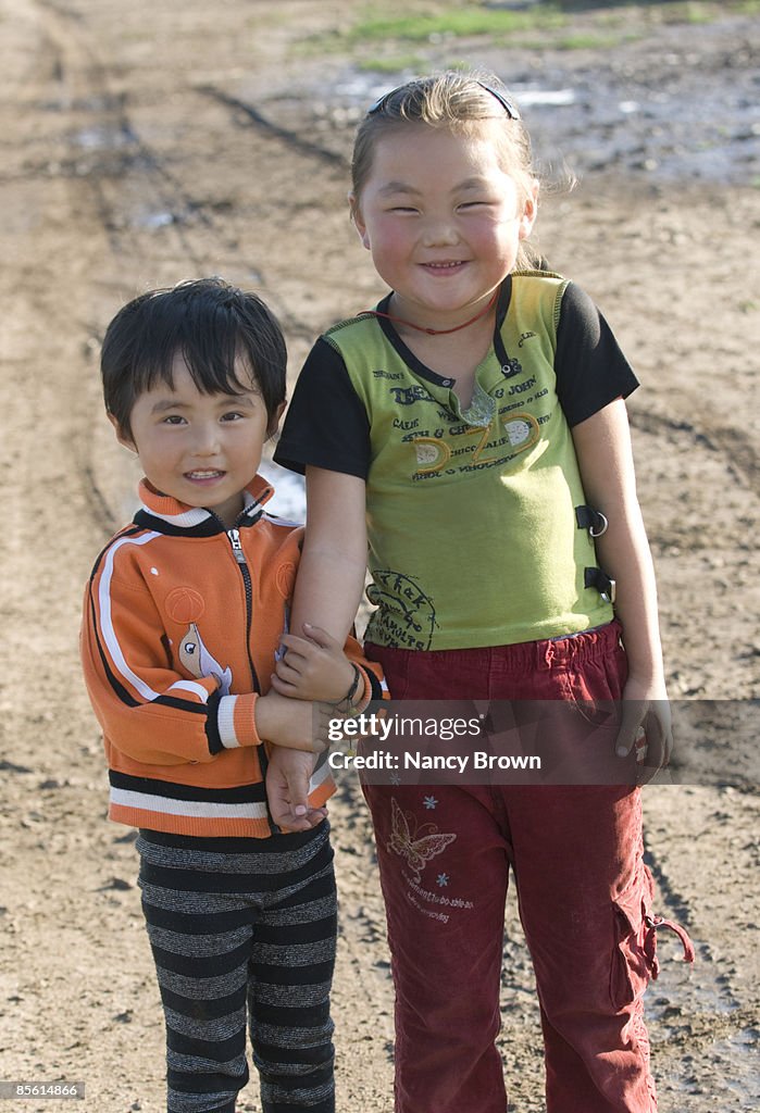 Inner Mongolian brother and sister at farm 