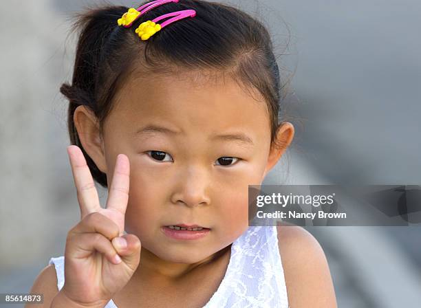 inner mongolian little girl head shot in xilinhot - xilinhot stock pictures, royalty-free photos & images