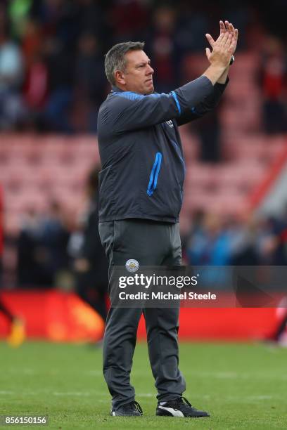 Craig Shakespeare the manager of Leicester applauds the travelling supporters after his side's 0-0 draw during the Premier League match between AFC...