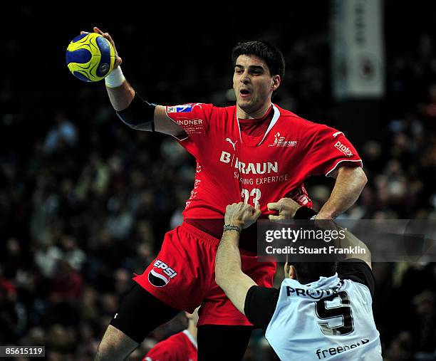 Nenad Vuckovic of Melsungen is challenged by Igor Anic of Kiel during the Toyota Handball Bundesliga match between THW Kiel and MT Melsungen at the...