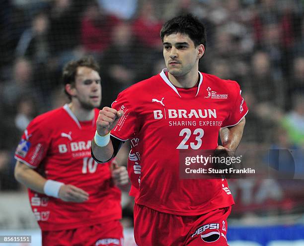 Nenad Vuckovic of Melsungen celebrates scoring a goal during the Toyota Handball Bundesliga match between THW Kiel and MT Melsungen at the...