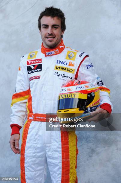 Fernando Alonso of Spain and Renault poses for photographers at the official drivers portrait session during previews to the Australian Formula One...