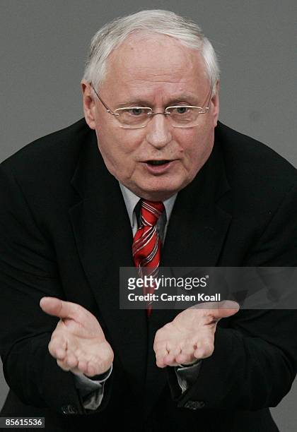 Oskar Lafontaine, Co Chairman of the German far left-wing party Die Linke, speaks after the government statement at the Bundestag ahead of the NATO...
