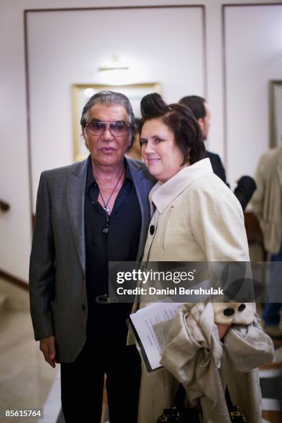 Fashion designer Roberto Cavalli poses with IHT fashion editor Suzy Menkes during the International Herald Tribune Sustainable Luxury 2009 conference...