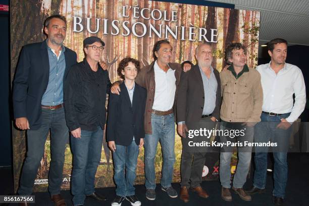 Franois Cluzet, Jean Scandel, Nicolas Vanier, Francois Berleand, Eric Elmosnino and guest attend the Paris premiere of 'L'Ecole Buissonniere' at...