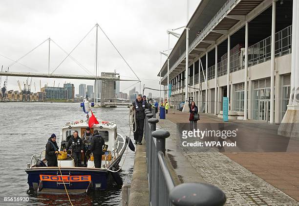 Metropolitan Police diving team carry out a security search of the Royal Victoria Dock ahead of next week's G20 summit at the nearby Excel Centre on...