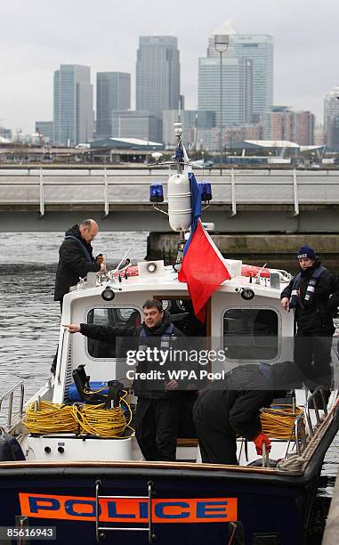 Metropolitan Police diving team carry out a security search of the Royal Victoria Dock ahead of next week's G20 summit at the nearby Excel Centre on...