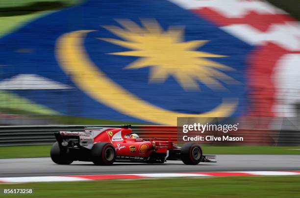 Sebastian Vettel of Germany driving the Scuderia Ferrari SF70H on track during the Malaysia Formula One Grand Prix at Sepang Circuit on October 1,...