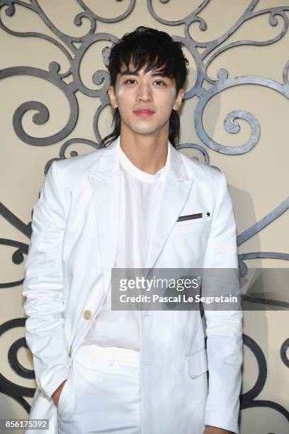 Xu Weizhou attends the Givenchy show as part of the Paris Fashion Week Womenswear Spring/Summer 2018 on October 1, 2017 in Paris, France.
