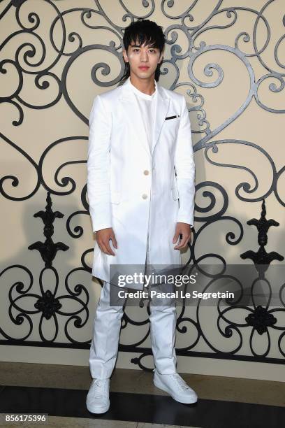 Xu Weizhou attends the Givenchy show as part of the Paris Fashion Week Womenswear Spring/Summer 2018 on October 1, 2017 in Paris, France.