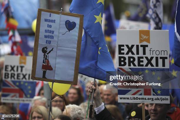 Anti-Brexit and anti-austerity activists take part in protests as the Conservative party annual conference gets underway at Manchester Central on...